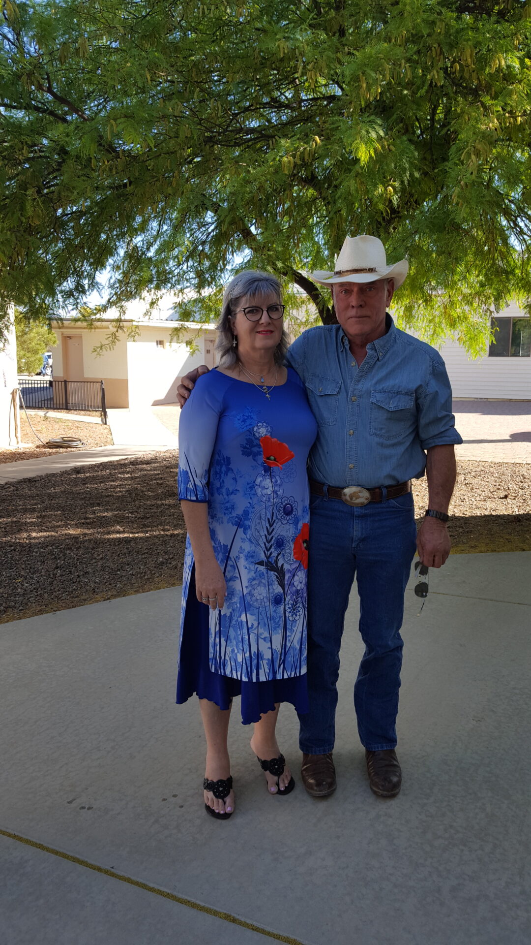 A man and woman standing next to each other.