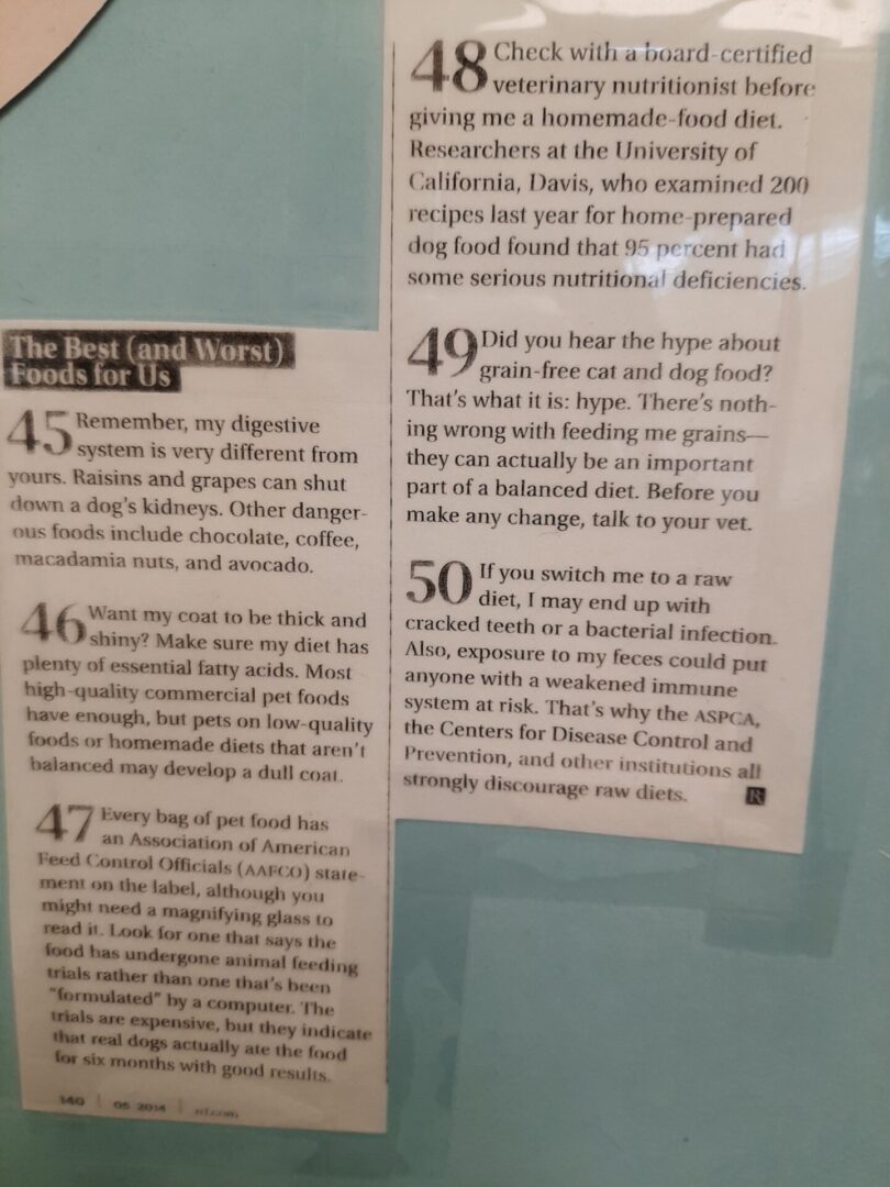 A close up of two articles on the wall